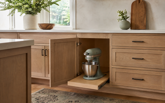 Wide establishing shot of a real lived-in kitchen, 16:10
