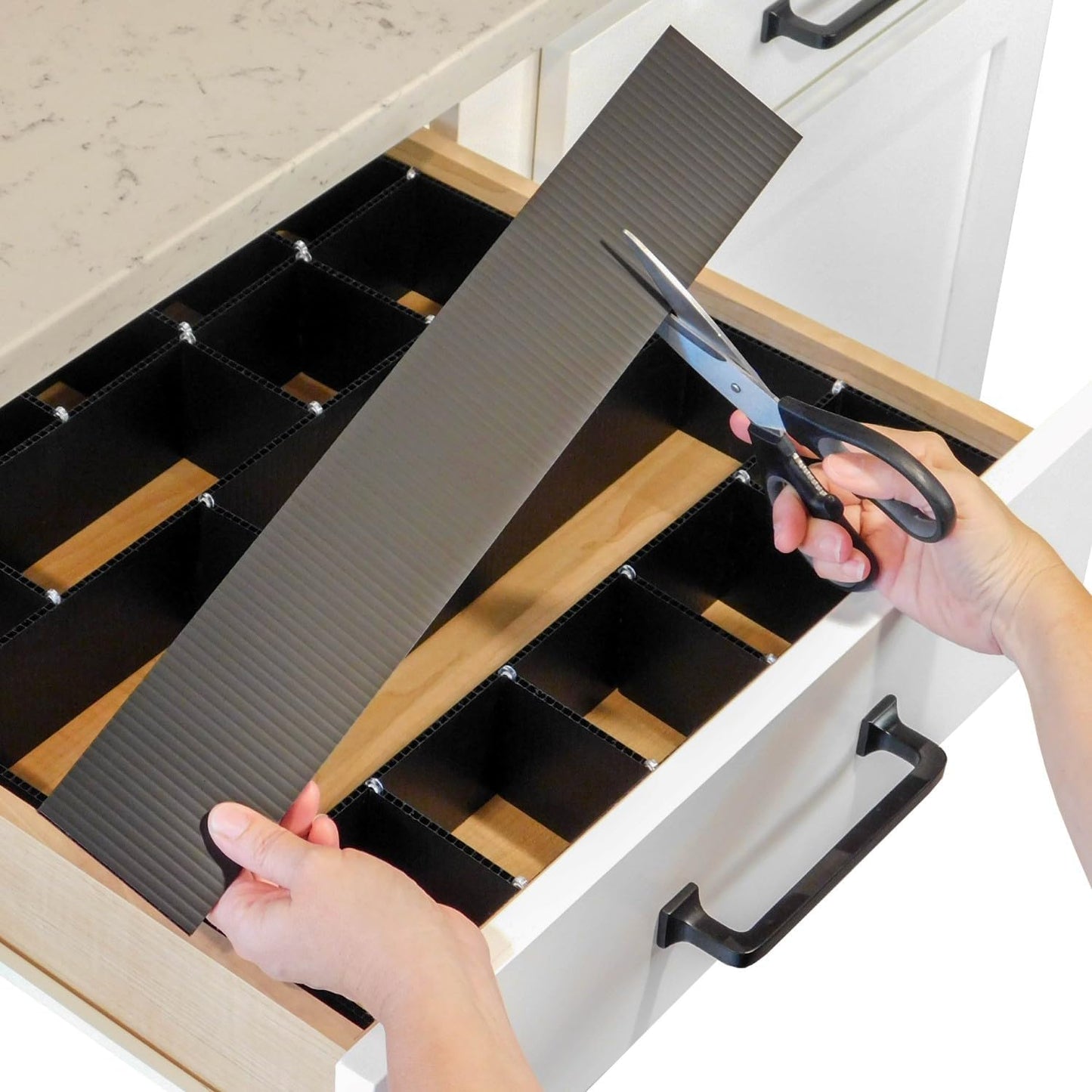 DRAWER DADDY The world’s most customizable grid drawer dividers for the kitchen, bathroom, desk