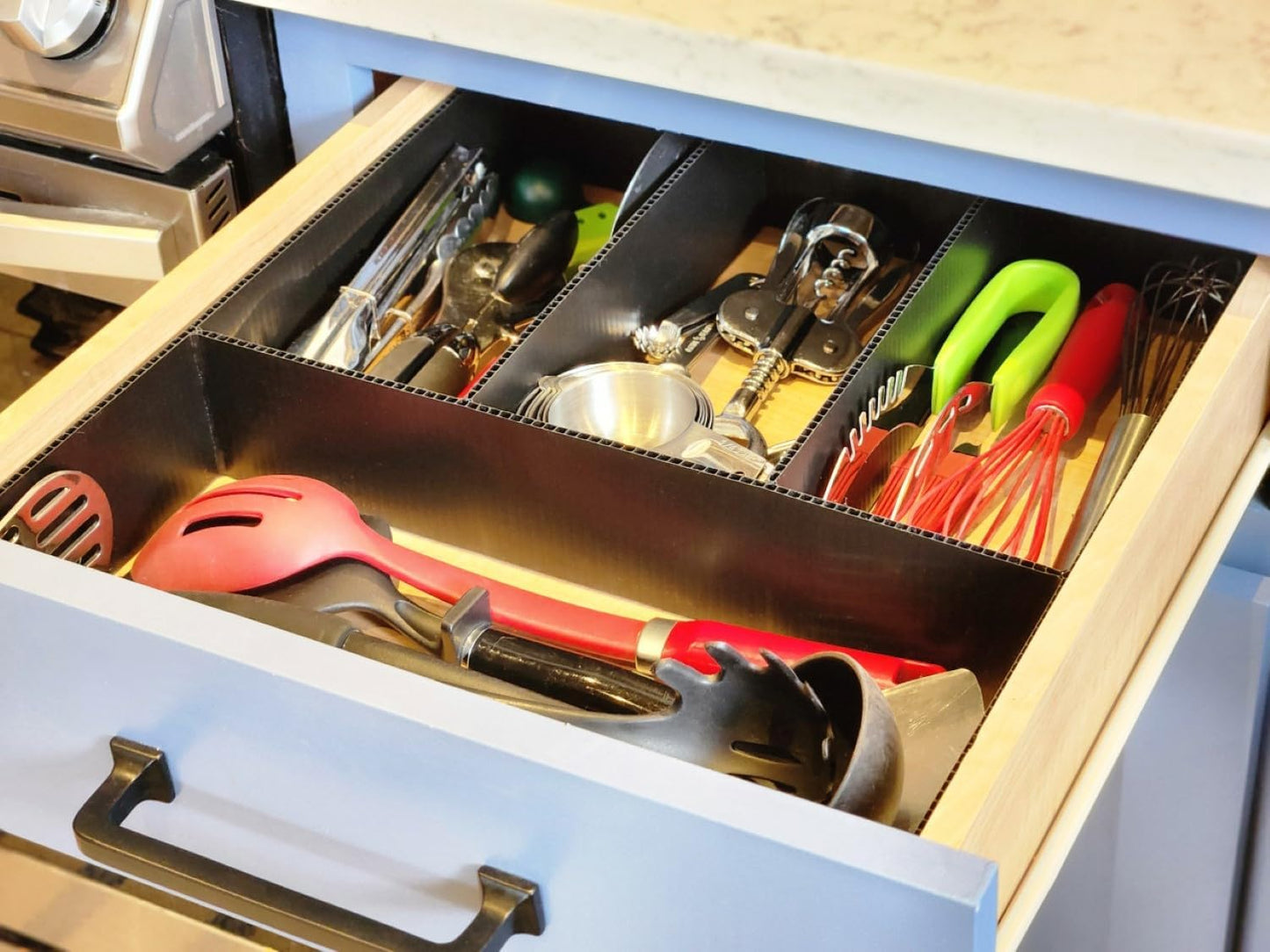 DRAWER DADDY The world’s most customizable grid drawer dividers for the kitchen, bathroom, desk